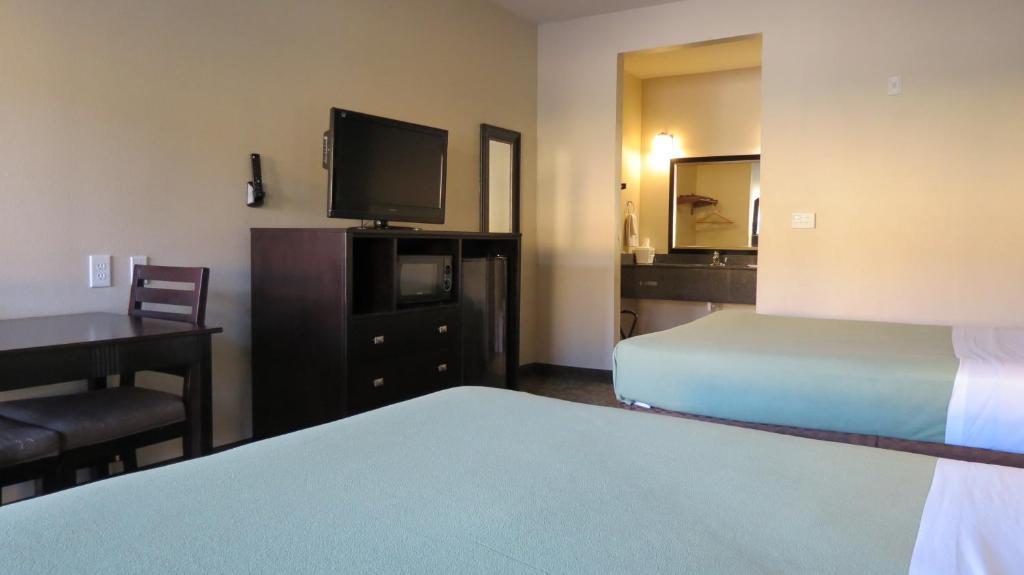 Grand Inn And Suites Houston Quarto foto